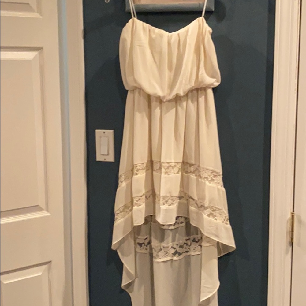 Sleeveless cream cocktail dress